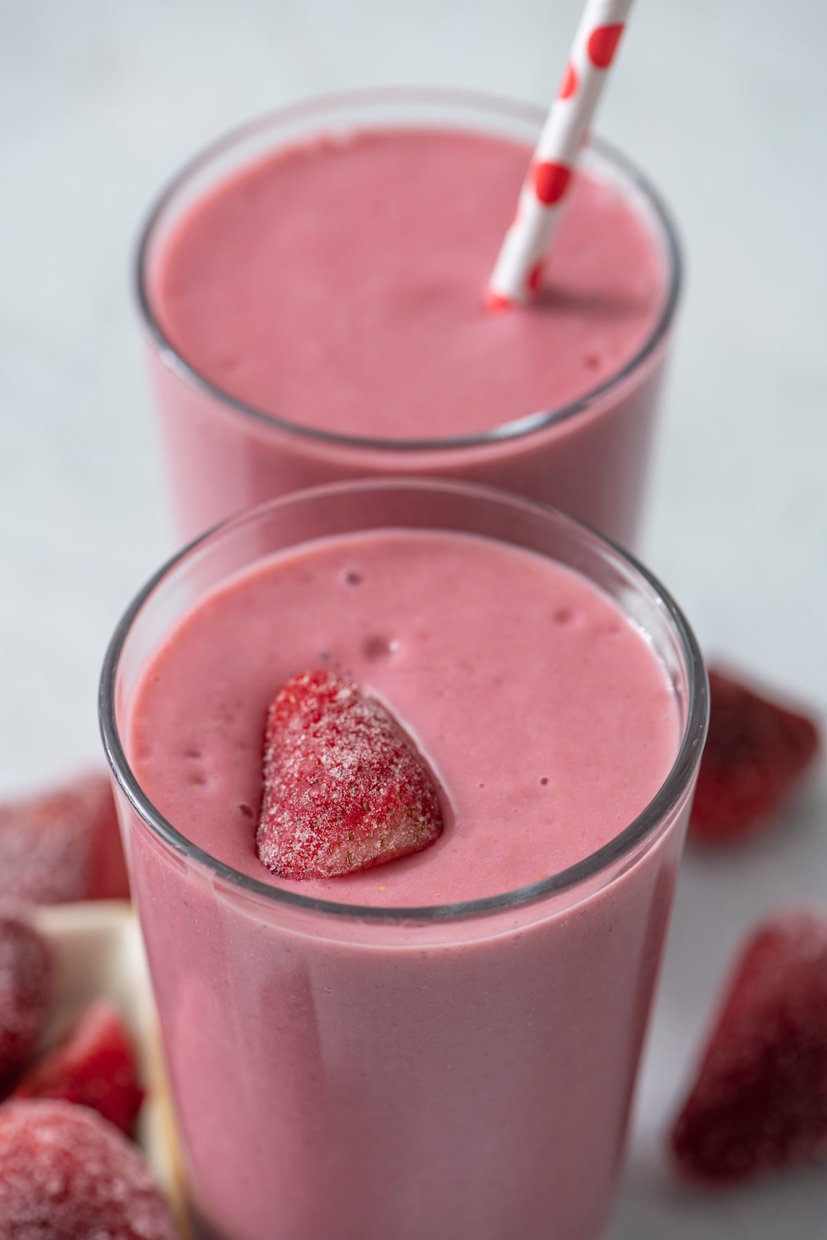 Two double berry smoothies in glasses.