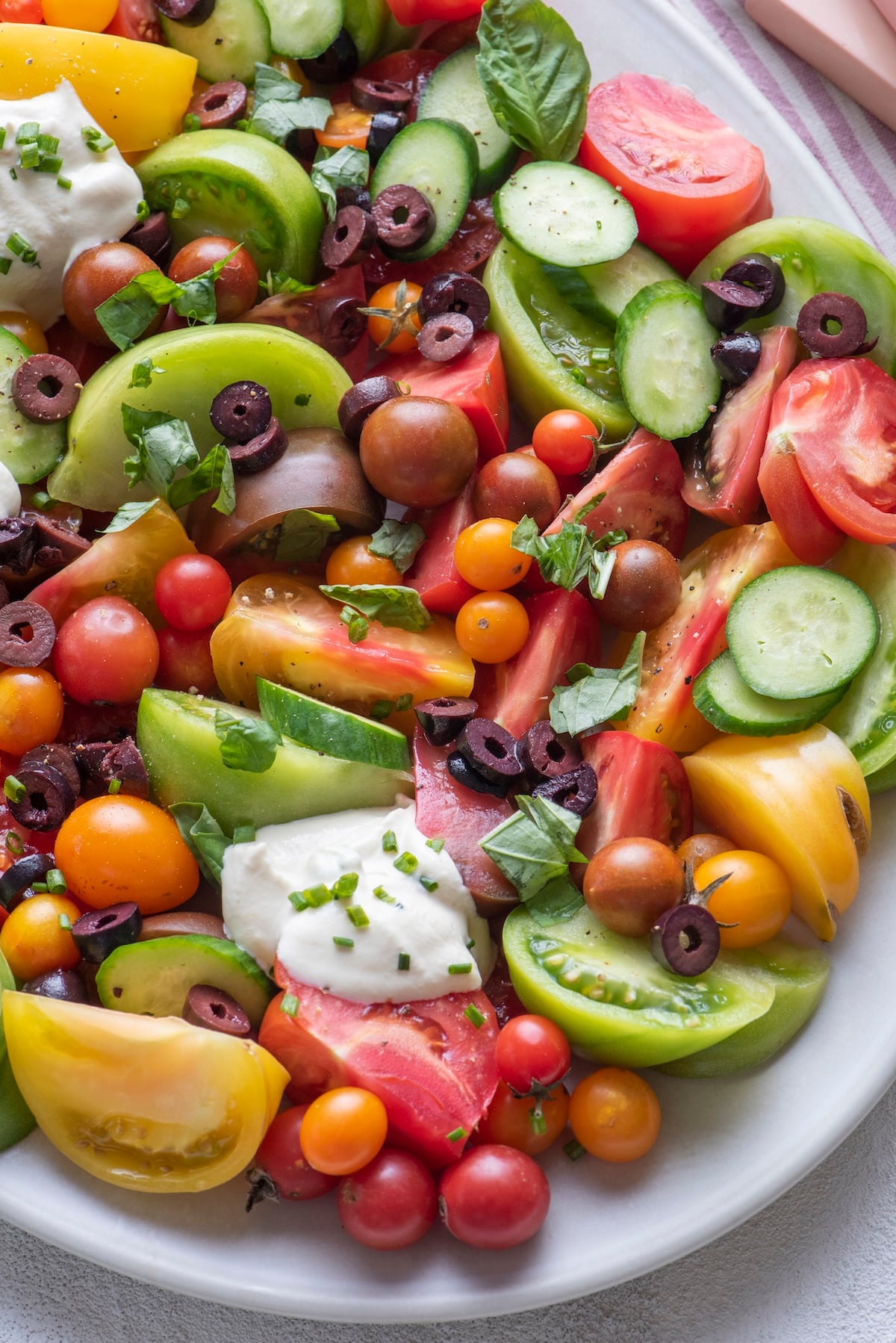 Heirloom tomato salad on a platter.