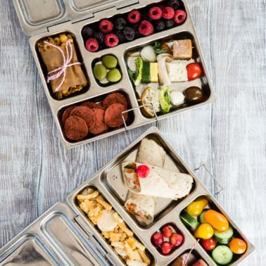 Bento boxes with sandwich free school lunches.