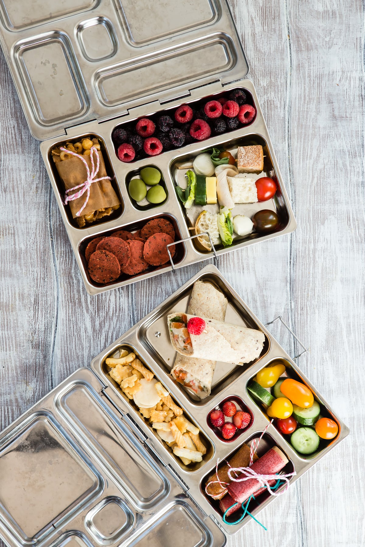 Bento boxes with sandwich free school lunches.