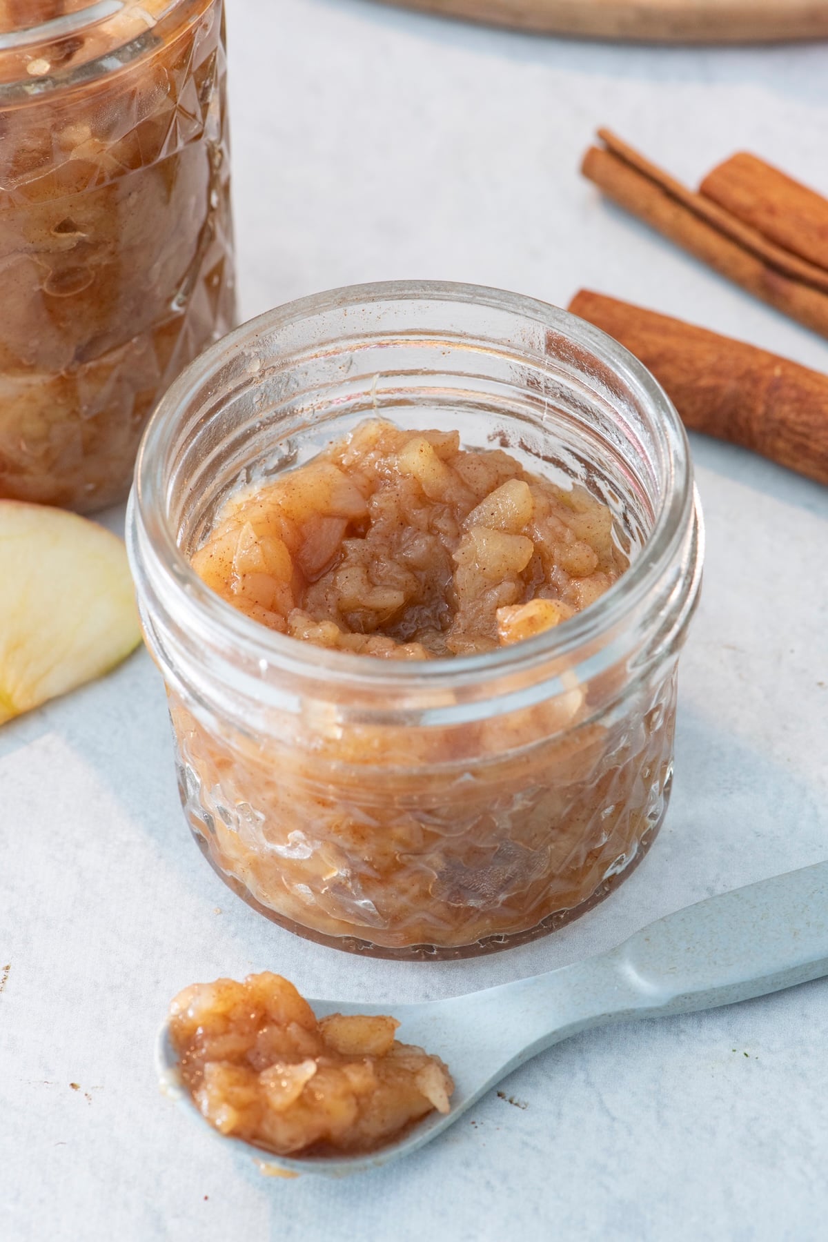 Homemade apple butter in a mason jar.