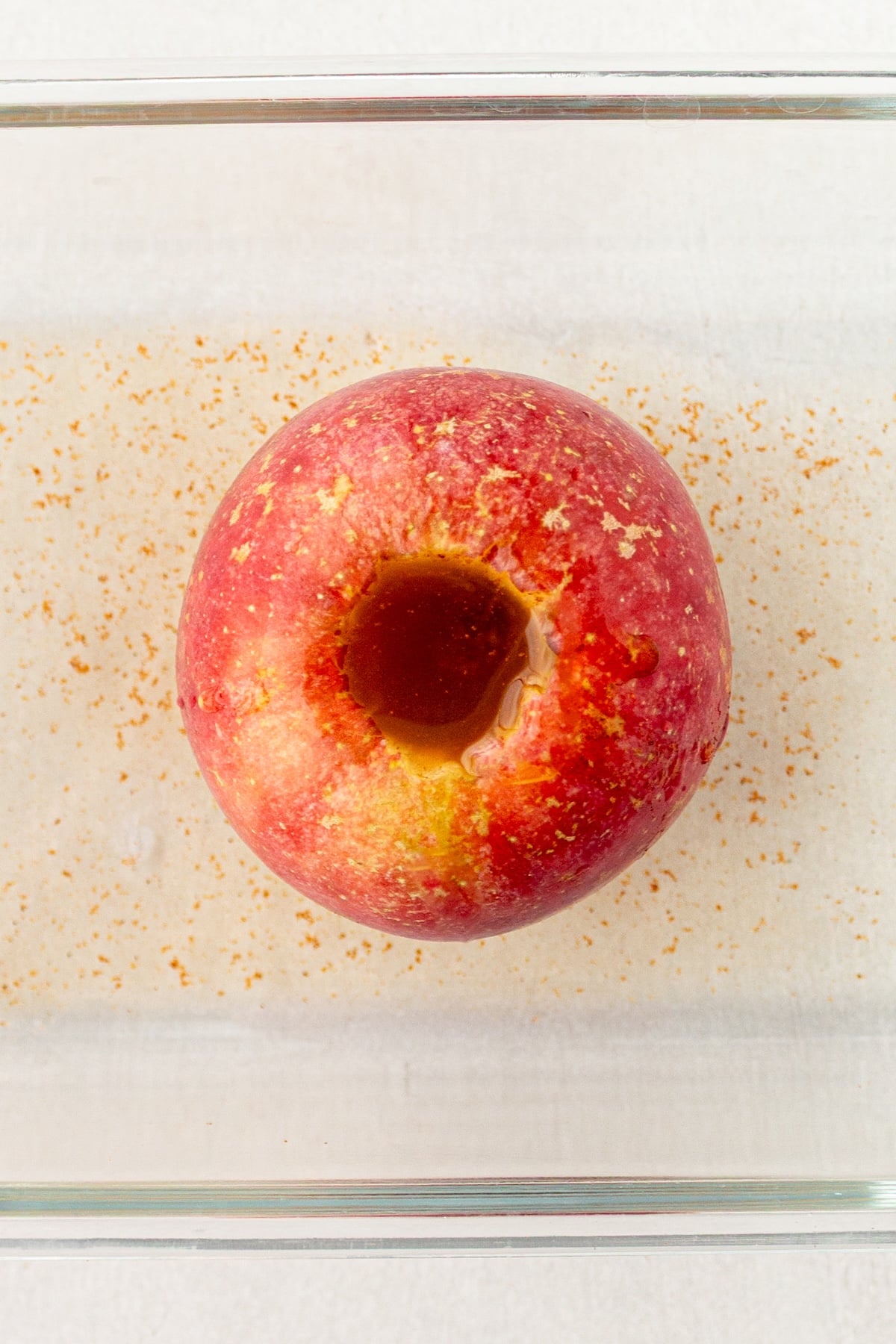 Baked apple filled with raisins and apple juice.