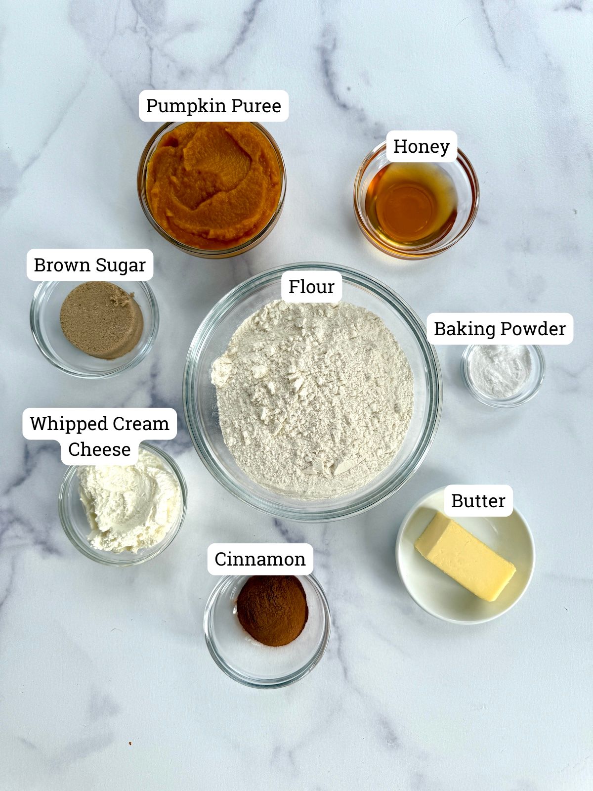 Ingredients needed for quick pumpkin cinnamon rolls.