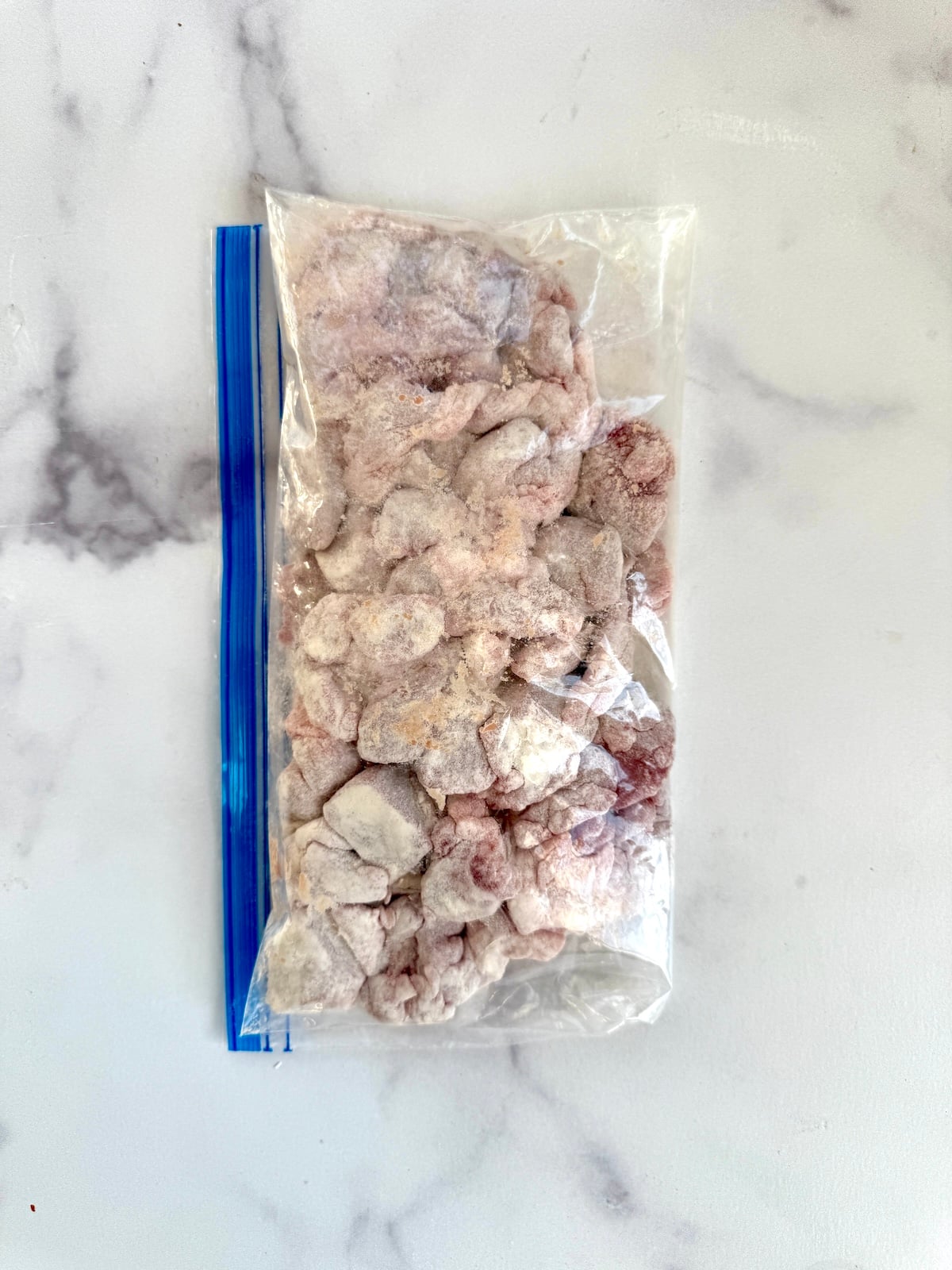 Beef chuck coated in flour.