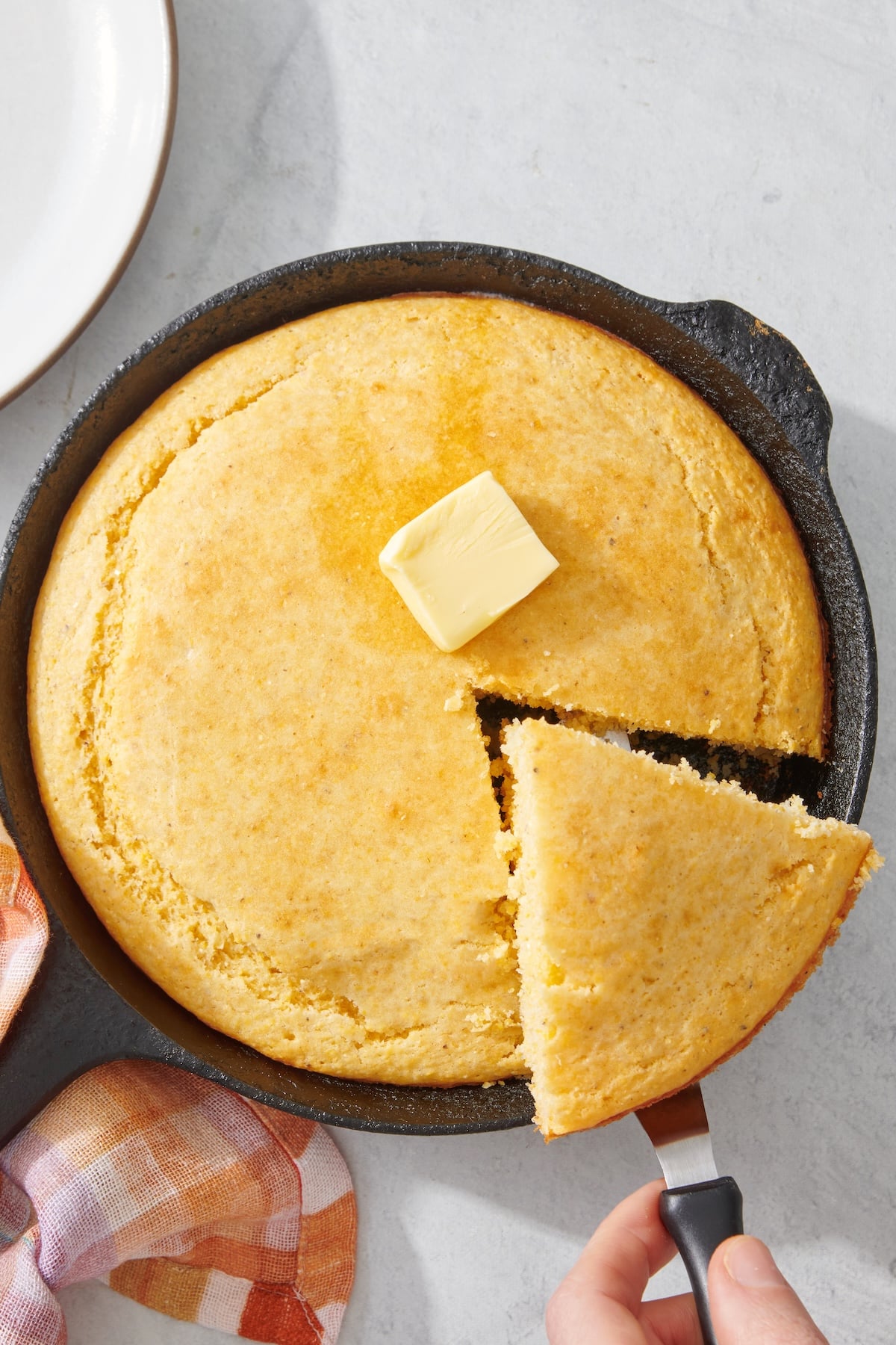 Basic cornbread recipe in a cast iron skilet.