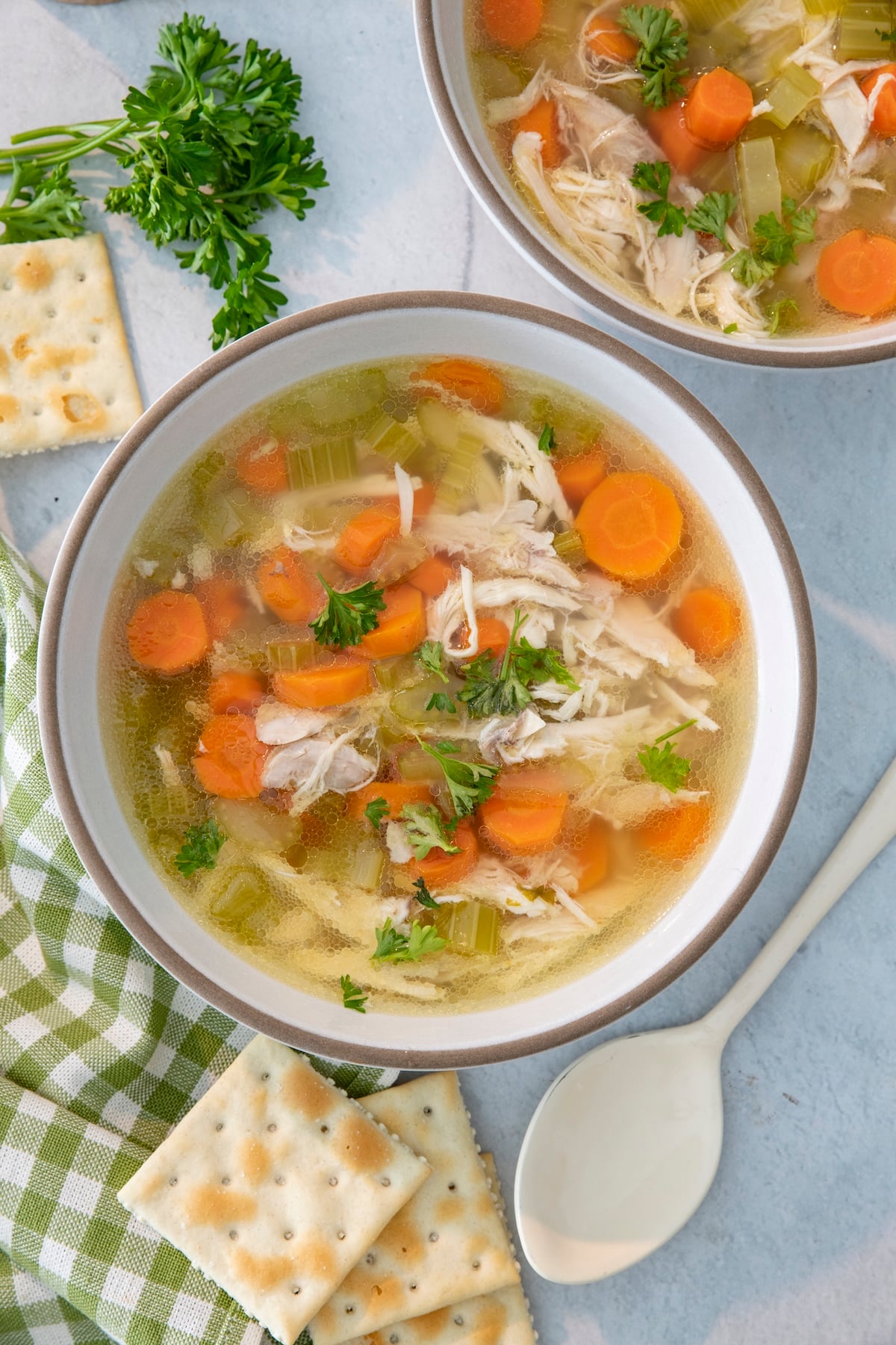 A bowl of chicken soup made in the pressure cooker.